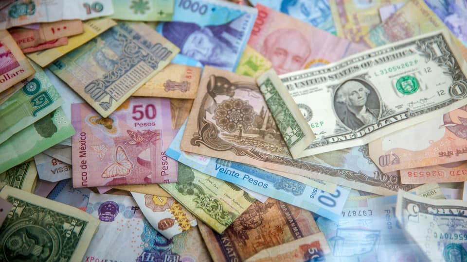 Stacked banknotes on a neutral surface